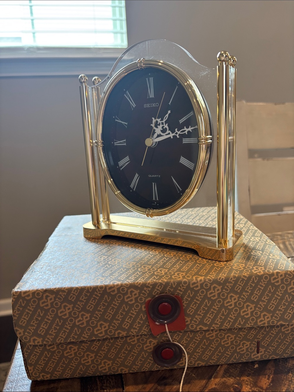 This is a vintage Seiko Quartz desk mantle clock